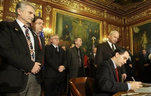 2024 6-11 don witnessing then gov scott walker signing the act 10 bill into law which don had input on..jpg