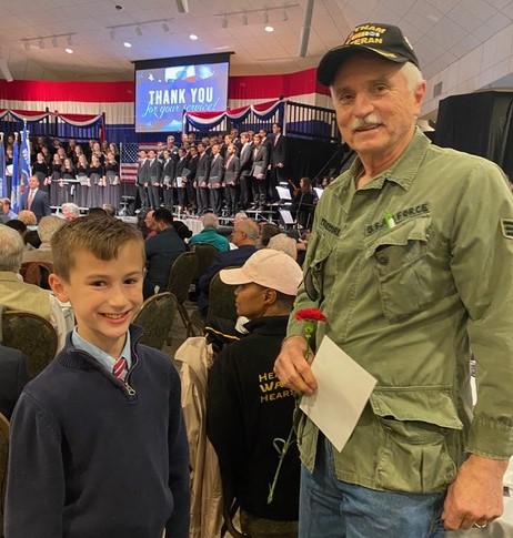 2024 don with an unknown student at a falls baptist church who is honored with other vererans on their day..jpeg